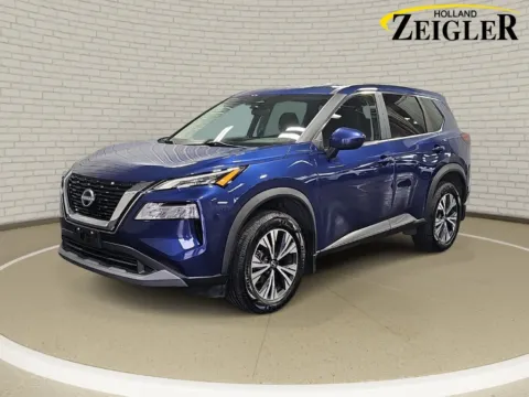 Blue 2023 Nissan Rogue SV for sale in Holland, MI