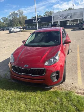 Red 2019 Kia Sportage LX for sale in Holland, MI