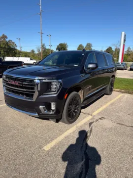 Gray 2024 GMC Yukon XL SLT for sale in Holland, MI