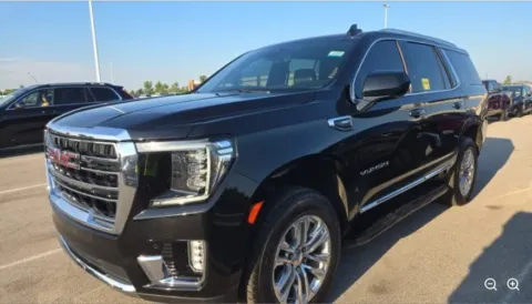 Black 2023 GMC Yukon SLT for sale in Holland, MI