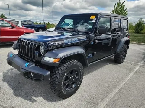 Black 2023 Jeep Wrangler Base 4xe for sale in Holland, MI