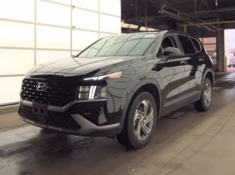 Black 2023 Hyundai Santa Fe SE for sale in Holland, MI