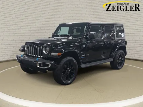 Black 2022 Jeep Wrangler Unlimited Sahara 4xe for sale in Holland, MI