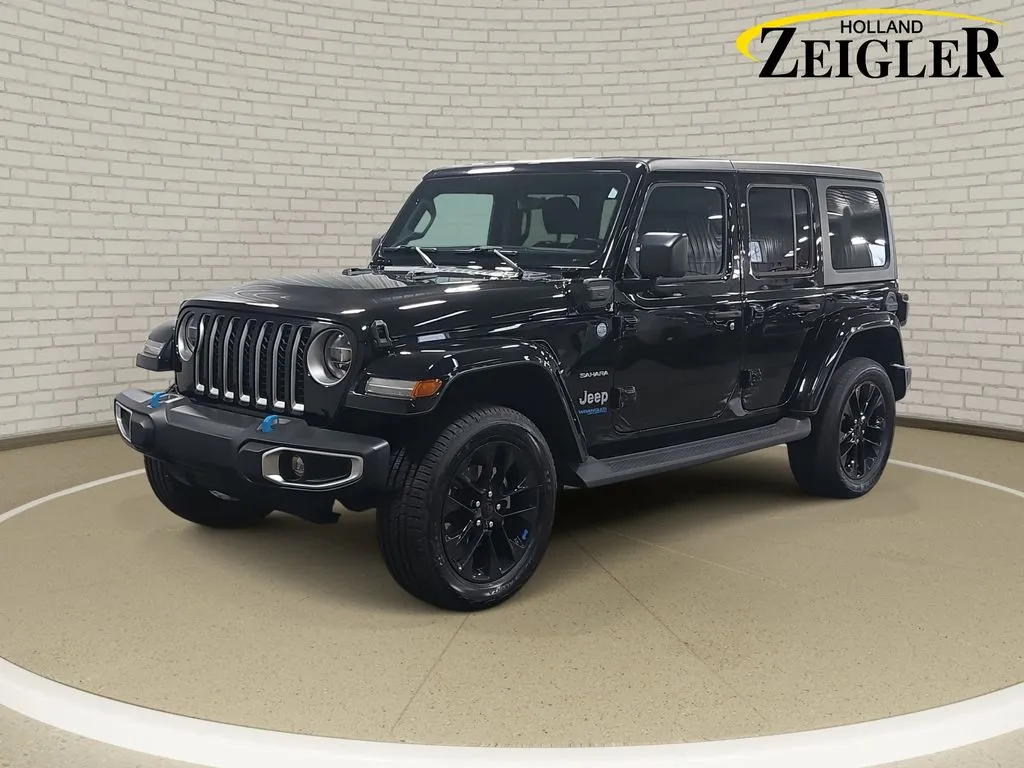 Black 2022 Jeep Wrangler Unlimited Sahara 4xe for sale in Holland, MI