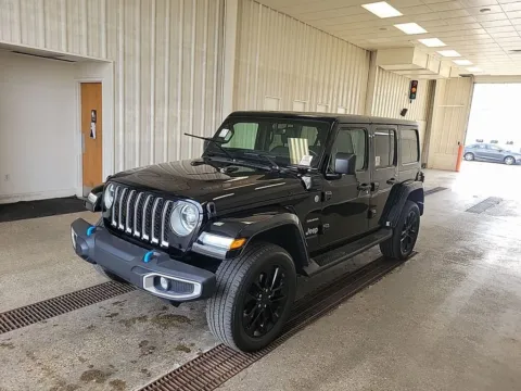 Black 2022 Jeep Wrangler Unlimited Sahara 4xe for sale in Holland, MI