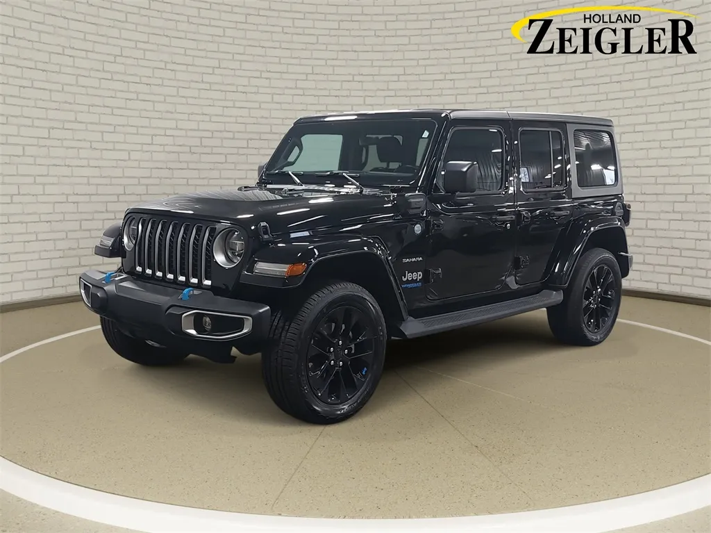 Black 2022 Jeep Wrangler Unlimited Sahara 4xe for sale in Holland, MI