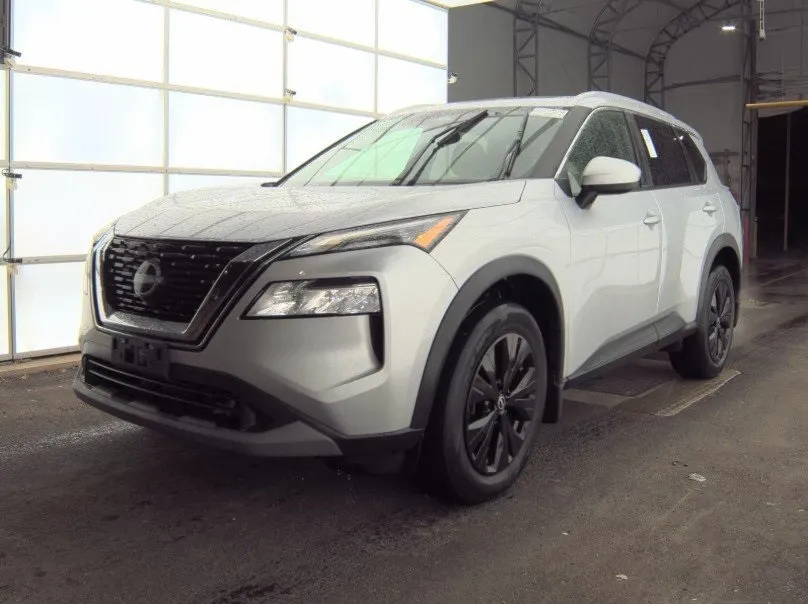 Silver 2023 Nissan Rogue SV for sale in Holland, MI