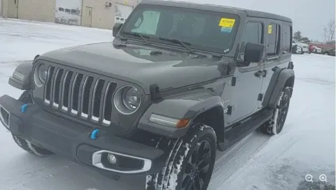 Gray 2023 Jeep Wrangler Sahara 4xe for sale in Holland, MI