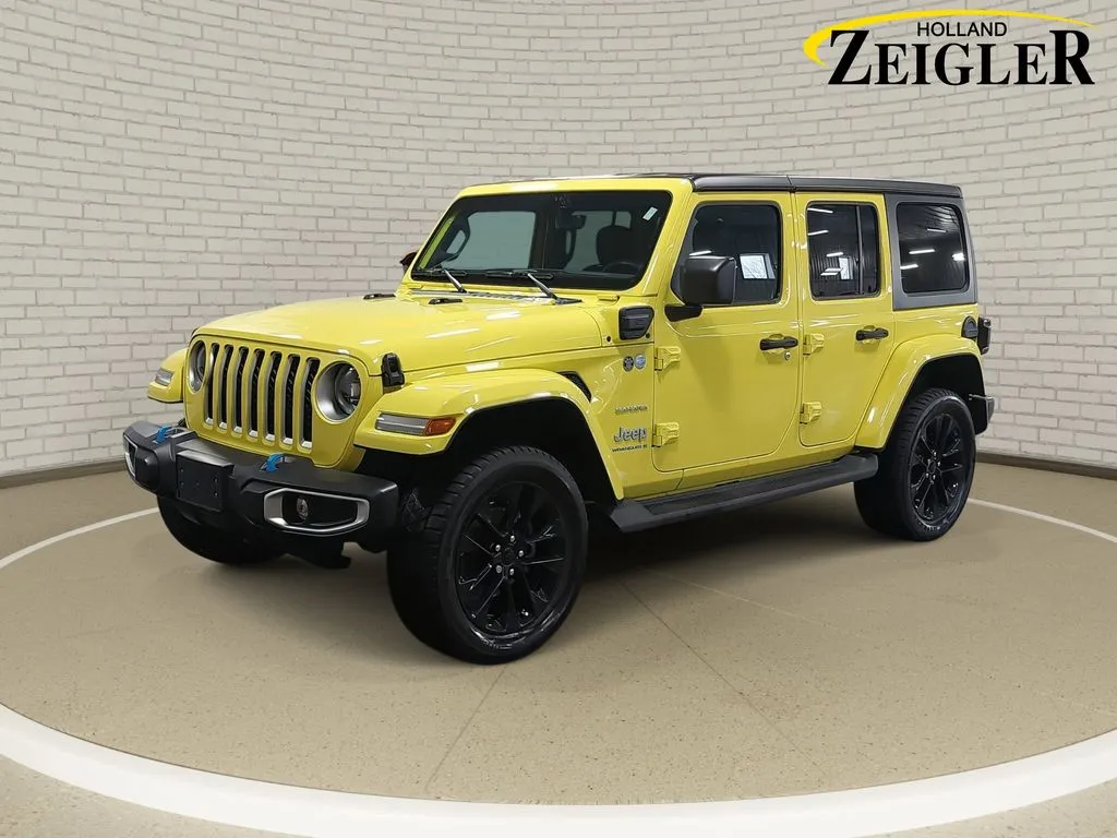Yellow 2023 Jeep Wrangler Sahara 4xe for sale in Holland, MI