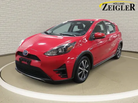 Red 2018 Toyota Prius c Four for sale in Holland, MI