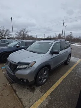 Beige 2019 Honda Passport Touring for sale in Holland, MI