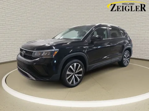 Black 2024 Volkswagen Taos 1.5T SE for sale in Holland, MI