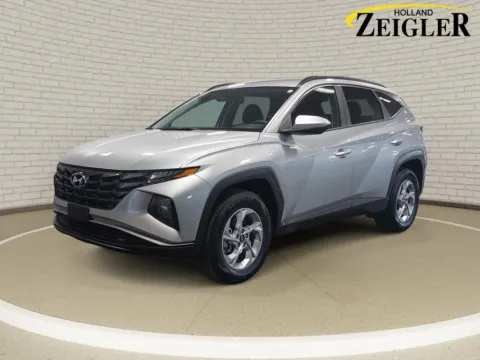 Silver 2024 Hyundai Tucson SEL for sale in Holland, MI