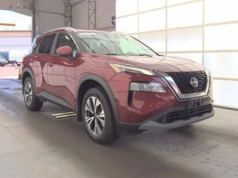 Red 2023 Nissan Rogue SV for sale in Holland, MI