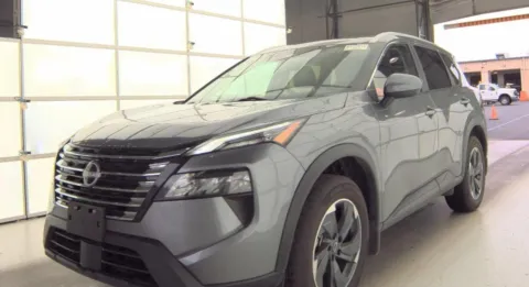 Gray 2024 Nissan Rogue SV for sale in Holland, MI