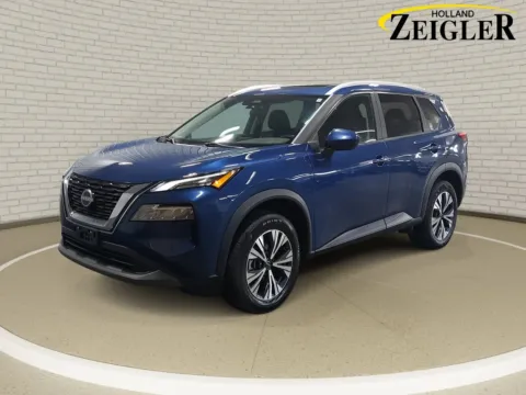 Blue 2023 Nissan Rogue SV for sale in Holland, MI