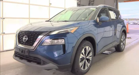 Blue 2023 Nissan Rogue SV for sale in Holland, MI