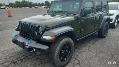 Green 2023 Jeep Wrangler Base 4xe for sale in Holland, MI