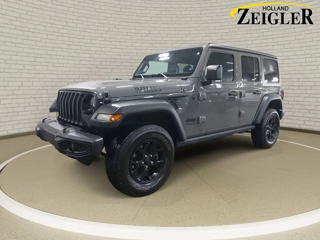 Gray 2022 Jeep Wrangler Unlimited Willys for sale in Holland, MI