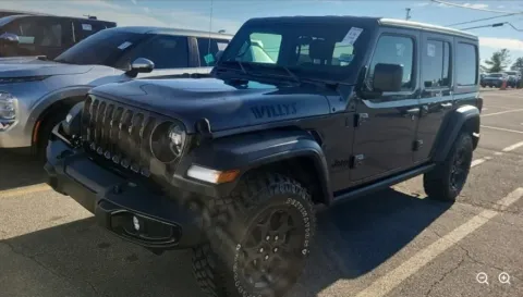 Gray 2023 Jeep Wrangler Willys for sale in Holland, MI