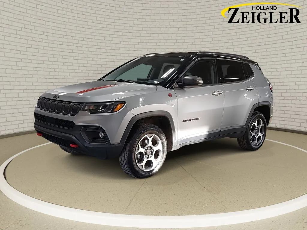 Silver 2022 Jeep Compass Trailhawk for sale in Holland, MI