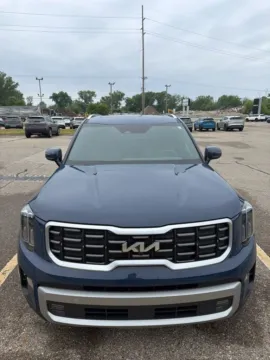 Blue 2024 Kia Telluride SX for sale in Holland, MI