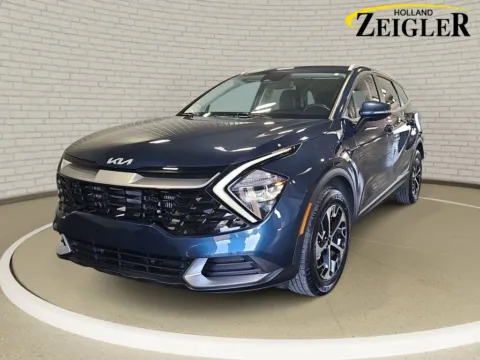 Blue 2023 Kia Sportage Hybrid EX for sale in Holland, MI