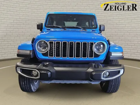 Photos of 2024 Jeep Wrangler Sahara for sale in Holland, MI at Zeigler Kia of Holland