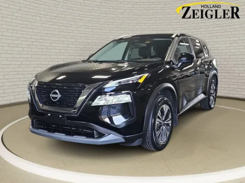 Black 2023 Nissan Rogue SV for sale in Holland, MI
