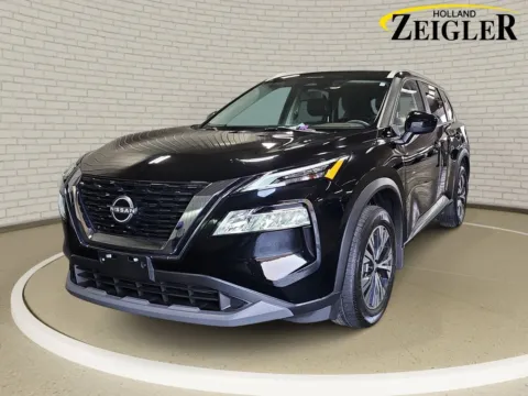 Black 2023 Nissan Rogue SV for sale in Holland, MI