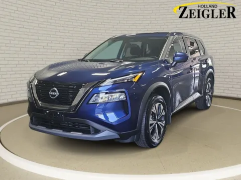 Blue 2023 Nissan Rogue SV for sale in Holland, MI