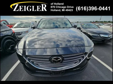 Photos of 2023 Mazda CX-9 Touring for sale in Holland, MI at Zeigler Kia of Holland
