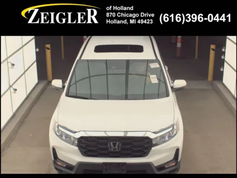 Photos of 2024 Honda Passport EX-L for sale in Holland, MI at Zeigler Kia of Holland