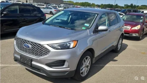 Silver 2024 Ford Edge SEL for sale in Holland, MI