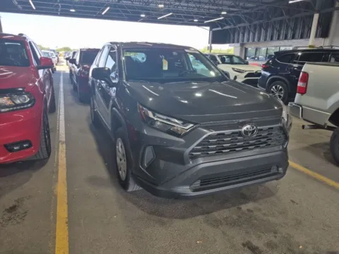 Gray 2024 Toyota RAV4 LE for sale in Holland, MI