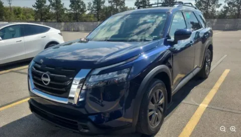 Blue 2024 Nissan Pathfinder SV for sale in Holland, MI