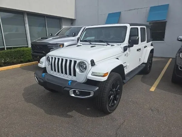 White 2022 Jeep Wrangler Unlimited Sahara 4xe for sale in Holland, MI