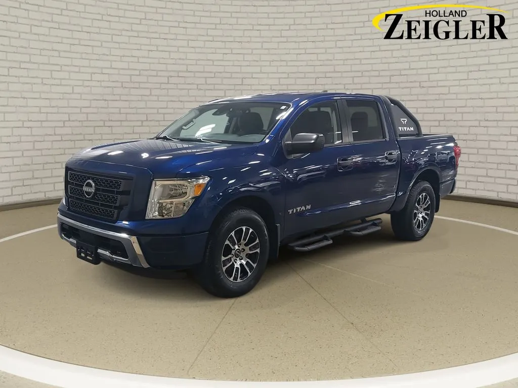 Blue 2024 Nissan Titan SV for sale in Holland, MI