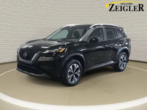 Black 2023 Nissan Rogue SV for sale in Holland, MI