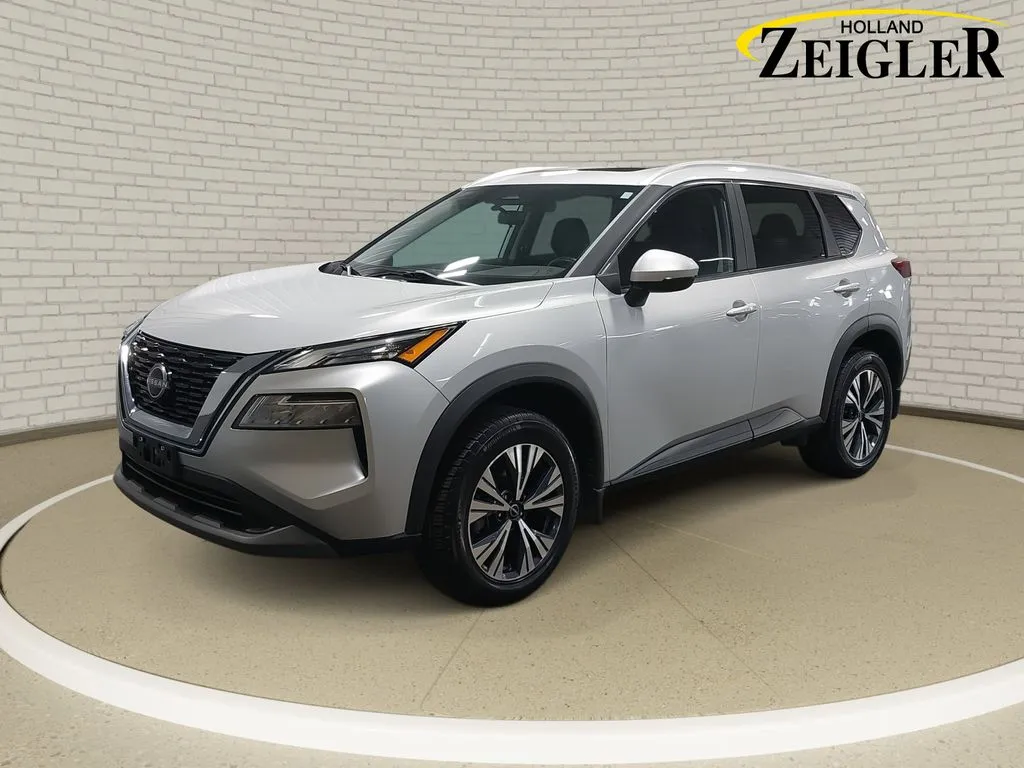Silver 2023 Nissan Rogue SV for sale in Holland, MI