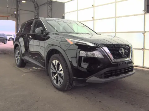 Black 2023 Nissan Rogue SV for sale in Holland, MI