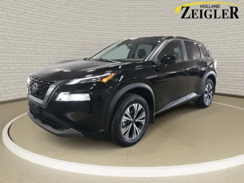 Black 2023 Nissan Rogue SV for sale in Holland, MI