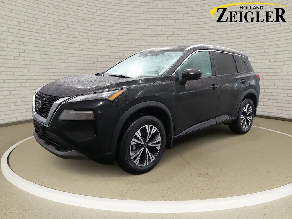 Black 2023 Nissan Rogue SV for sale in Holland, MI