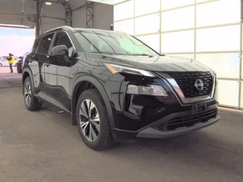 Black 2023 Nissan Rogue SV for sale in Holland, MI