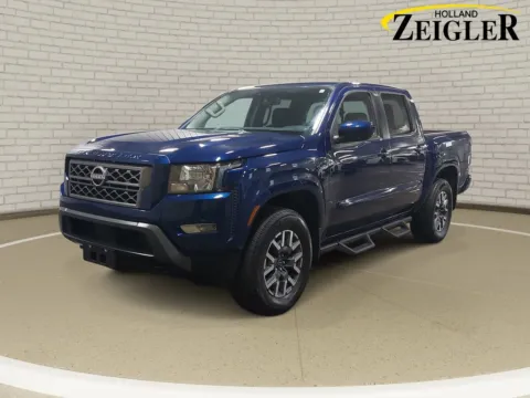 Blue 2023 Nissan Frontier SV for sale in Holland, MI