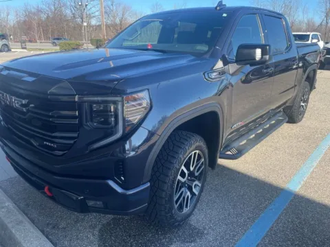 Gray 2023 GMC Sierra 1500 AT4 for sale in Holland, MI