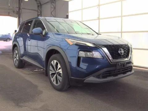 Blue 2023 Nissan Rogue SV for sale in Holland, MI