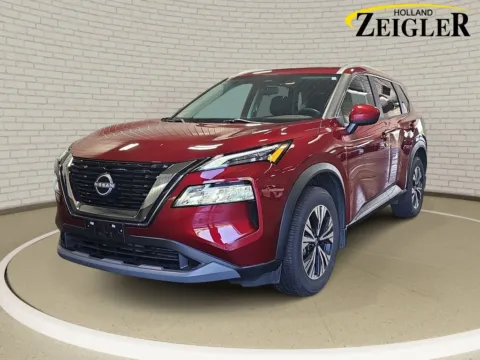 Red 2023 Nissan Rogue SV for sale in Holland, MI