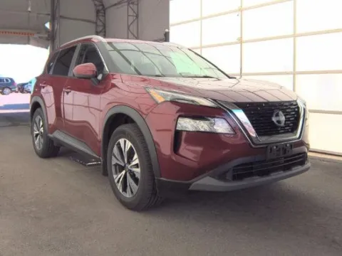 Red 2023 Nissan Rogue SV for sale in Holland, MI