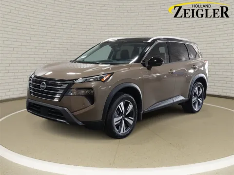 Beige 2024 Nissan Rogue SL for sale in Holland, MI